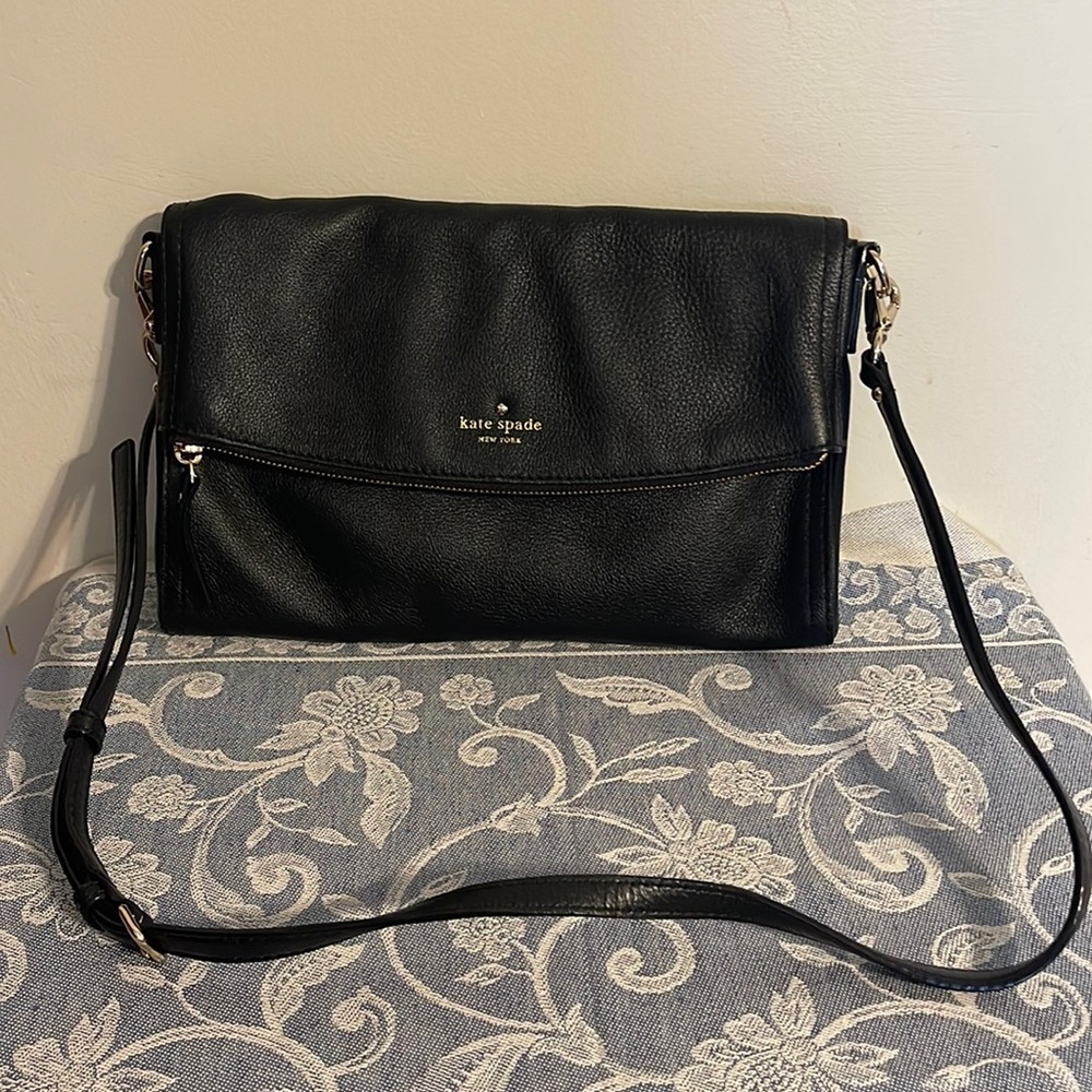 Kate spade black pebbled leather flap front cross body bag. Excellent cond.